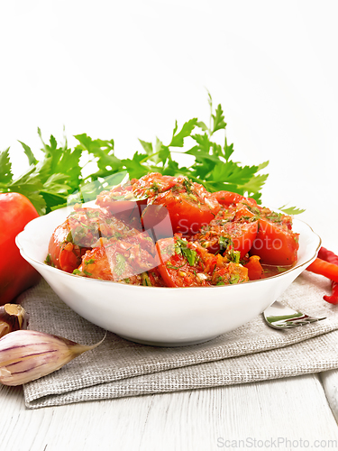 Image of Tomatoes Korean in plate on table