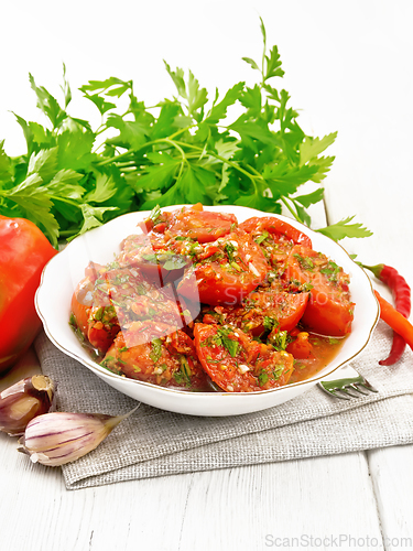 Image of Tomatoes Korean in plate on wooden board