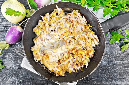 Image of Turnip fried in pan on board top