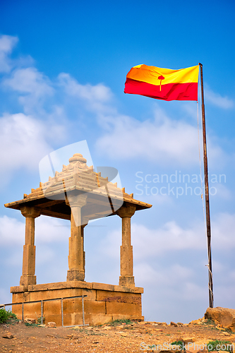 Image of Jaisalmer flag near Bada Bagh cenotaphs Hindu tomb mausoleum . Jaisalmer, Rajasthan, India