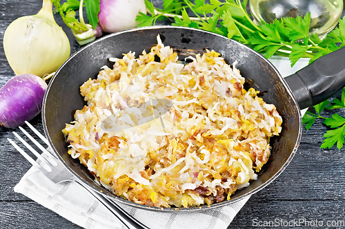 Image of Turnip fried in pan on board
