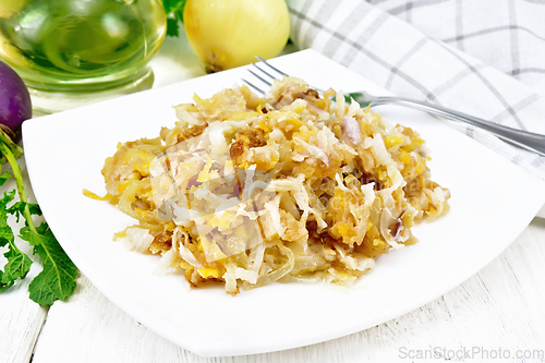 Image of Turnip fried in plate on wooden board