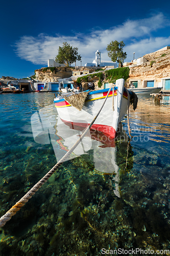 Image of Fishing boats in harbour in fishing village of Mandrakia, Milos island, Greece