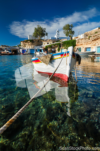 Image of Fishing boats in harbour in fishing village of Mandrakia, Milos island, Greece