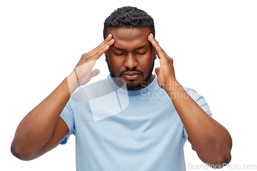 Image of stressed young african american man with headache