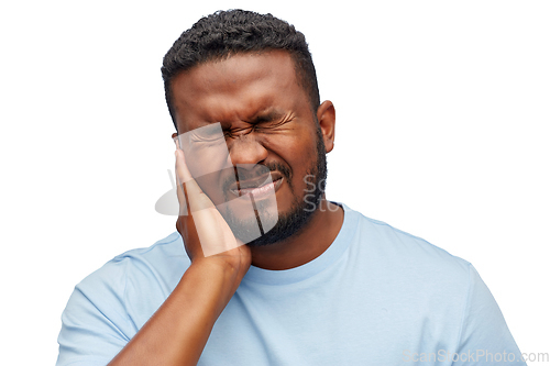 Image of african american man suffering from toothache