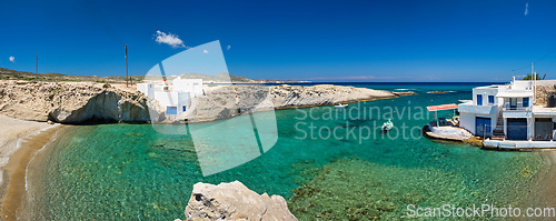 Image of Crystal clear blue water at MItakas village beach, Milos island, Greece.