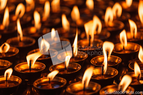 Image of Burning candles in Buddhist temple