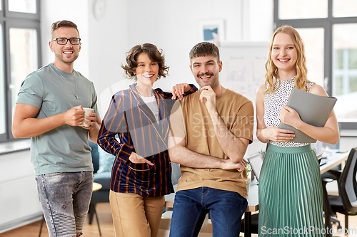 Image of happy business team at office