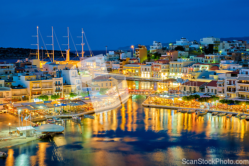 Image of Beautiful Agios Nikolaos town at night. Lasithi region of Crete island, Greece