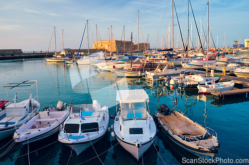 Image of Venetian Fort in Heraklion and moored fishing boats, Crete Island, Greece