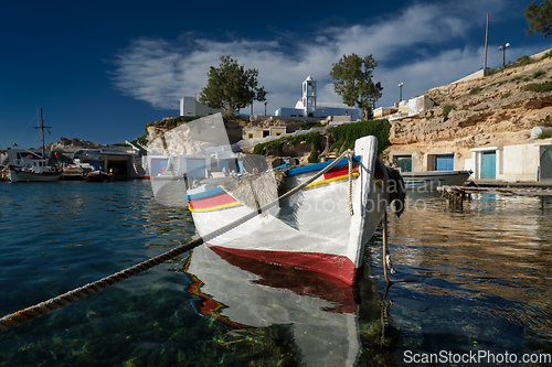 Image of Fishing boats in harbour in fishing village of Mandrakia, Milos island, Greece