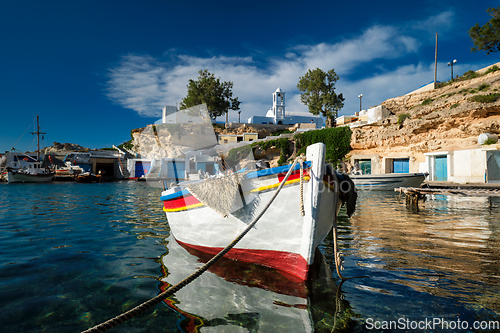 Image of Fishing boats in harbour in fishing village of Mandrakia, Milos island, Greece