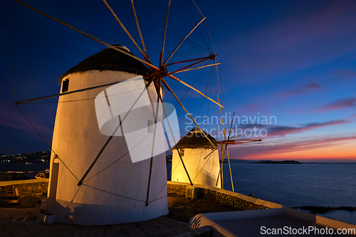 Image of Traditional greek windmills on Mykonos island at sunrise, Cyclades, Greece