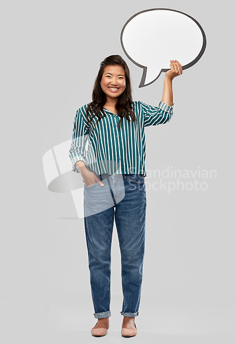 Image of happy asian woman holding speech bubble