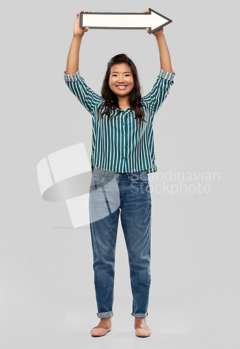 Image of happy smiling asian woman with rightwards arrow