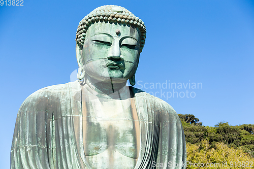 Image of Big Buddha bronze statue and blue sky