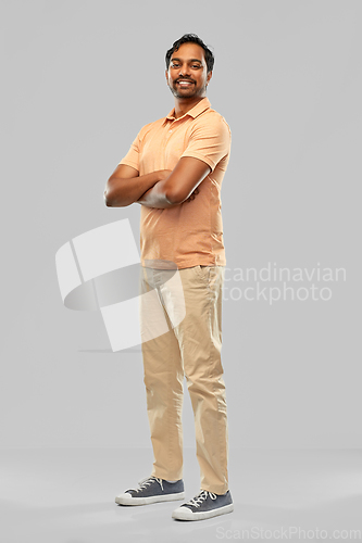 Image of portrait of happy smiling young indian man