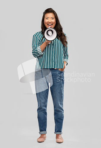 Image of happy smiling asian woman speaking to megaphone