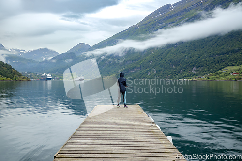 Image of Woman fishing on Fishing rod spinning in Norway.