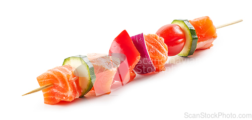 Image of fresh raw salmon and vegetable skewer