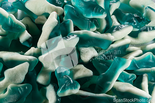 Image of Green and White Gummy Candy Fish Background