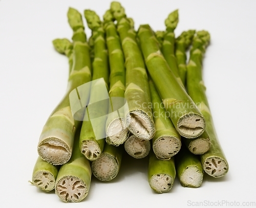 Image of a bundle of asparagus on a white background