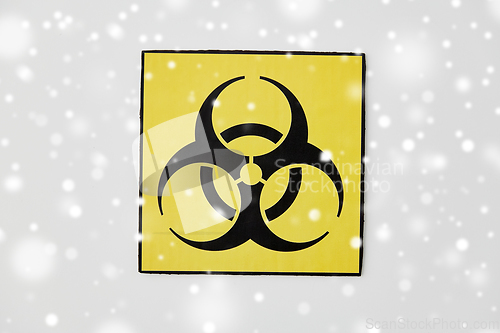 Image of biohazard caution sign on white background