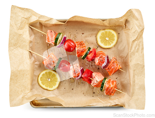 Image of raw salmon and vegetable skewers