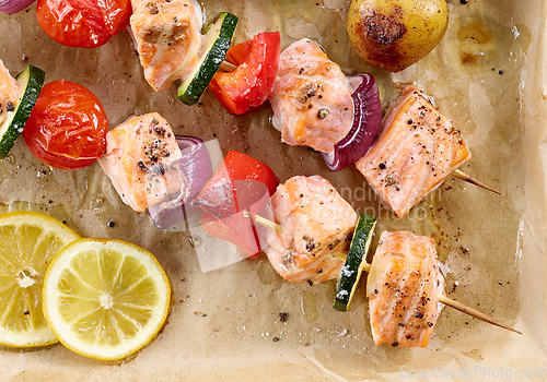 Image of close up of roasted salmon and vegetable skewers