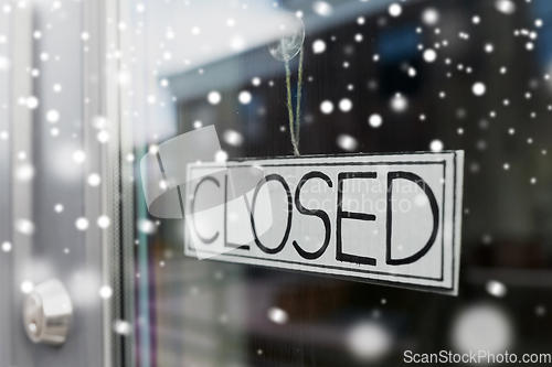 Image of glass door of closed shop or office