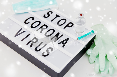 Image of lightbox with stop coronavirus caution words