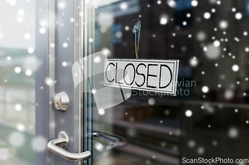 Image of glass door of closed shop or office