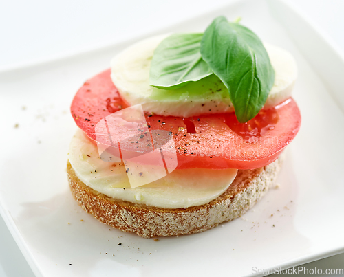 Image of bruschetta with tomato and mozzarella