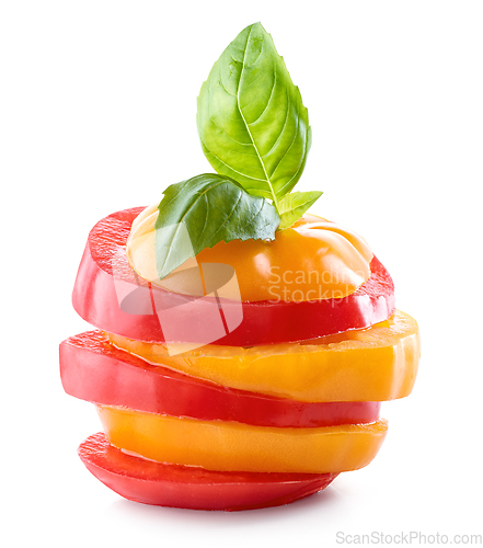 Image of stack of red and yellow tomato slices