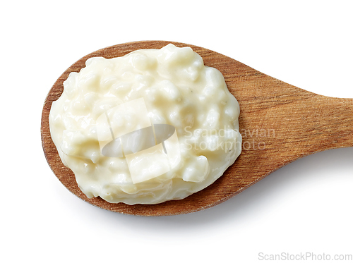 Image of spoon of rice milk pudding