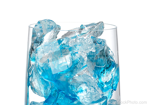 Image of ice cubes and blue syrup in a glass