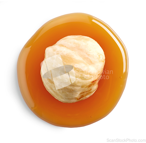 Image of hazelnut in caramel sauce