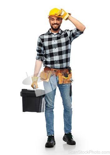 Image of happy worker or builder in helmet with tool box