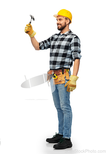 Image of happy male worker or builder in helmet with hammer