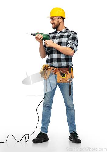 Image of happy male worker or builder in helmet with drill