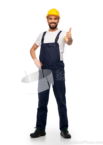 Image of male worker or builder showing thumbs up