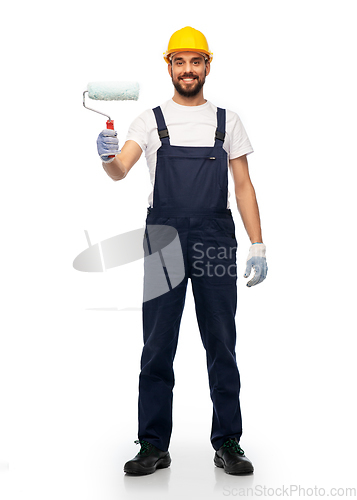 Image of male worker or builder with paint roller