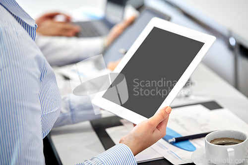 Image of businesswoman with tablet pc computer at office