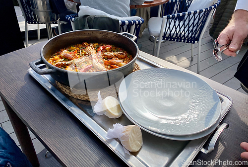 Image of Traditional Paella served at restaurant in Marbella, Spain