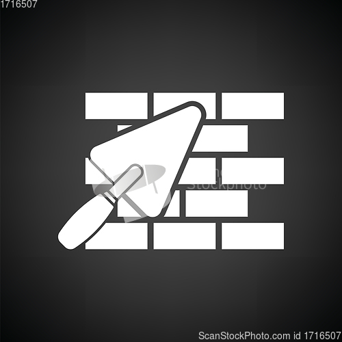 Image of Icon of brick wall with trowel