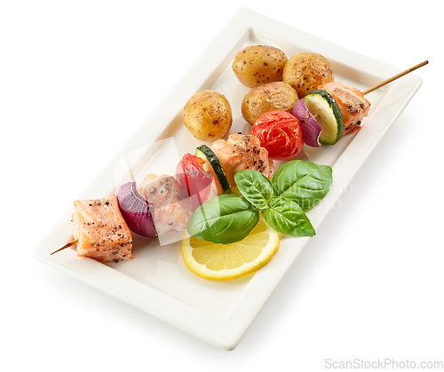 Image of plate of salmon and vegetable skewer