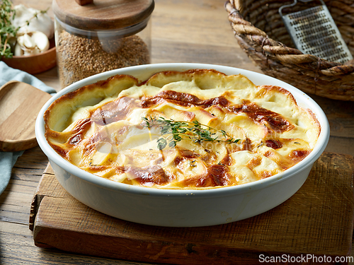 Image of bowl of freshly baked potato gratin