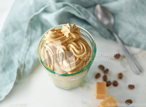 Image of glass of whipped coffee and caramel mousse cream
