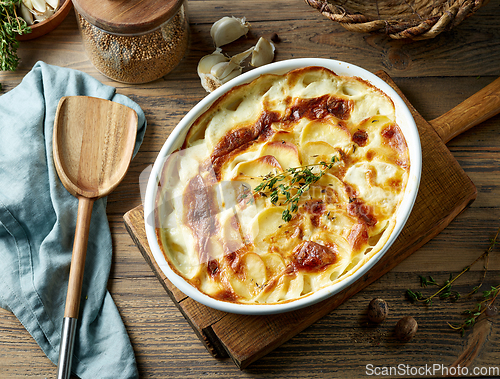 Image of bowl of freshly baked potato gratin